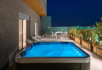 RhodesRentalsgr presents Rhodes Skyline Suites has rooms with a private hot tub
