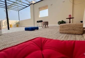 Luxury 4BHK Penthouse with Theatre, Jacuzzi & Private Terrace has rooms with a private hot tub