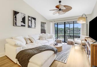 Naples lakeview modern home has rooms with a private hot tub