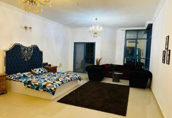 Tranquil Haven King Bed Ensuite Fully Furnished Bedroom has rooms with a private hot tub