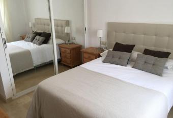 Bright rooms in a Large Self-contained apartment-pool& some seaview-2 adults only use 1 room has rooms with a private hot tub