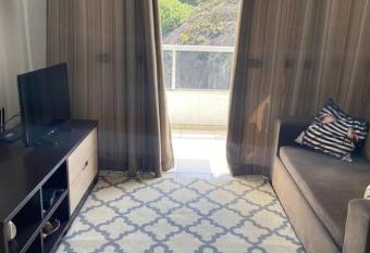 Apartamento bem localizado allows 18 year olds to book a room