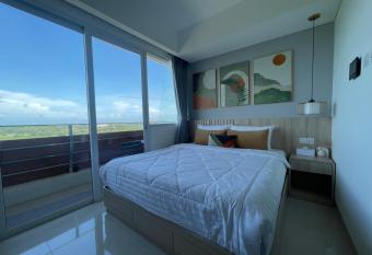 Sea View Apartment at Nuvasa Bay Kalani Tower in Nongsa Area has Balcony rooms