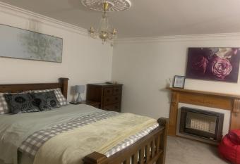 Spacious queen bedroom with Tv sofa allows 18 year olds to book a room