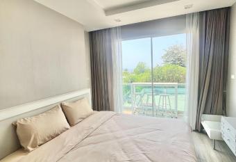 Th Blu X condo B has Balcony rooms