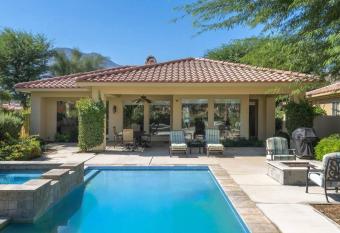 PGA privacy Home with Pool/Spa on the Golf Course has rooms with a private hot tub