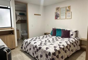 Aluna Apto/ Wellness and Enjoy has rooms with a private hot tub