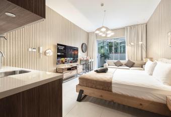 Luxurious studio apartment with private garden has rooms with a private hot tub