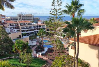 Lovely apartment top views, heated pool, great location has Balcony rooms