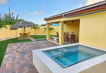 Yellow Cunucu-4 Bedrooms House has rooms with a private hot tub