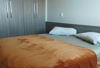 Quarto Confort  vel Centro e perto de Hospital allows 18 year olds to book a room