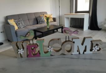 Cozy Apartment with Fireplace has rooms with a private hot tub