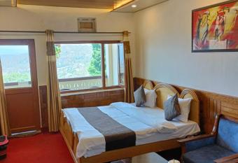 Hotel Tribhuvan Ranikhet Near Mall Road - Mountain View -Parking Facilities - Excellent Customer Service Awarded - Best Seller has Balcony rooms