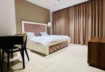 Luxury Studios Key8 (2BHK) with Pretty Urbana View has rooms with a private hot tub