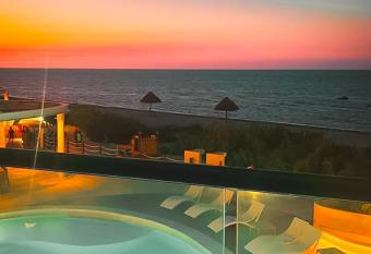 Luxury Ocean Front Apartment has rooms with a private hot tub