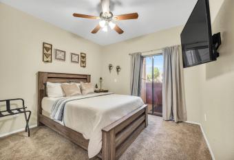 Comfy Condo with Heated Pool and Gym has rooms with a private hot tub