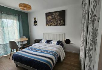 Studio avec jardin et parking 03 has Balcony rooms