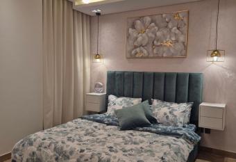 Luxury Romantic Sea View Apartment. has rooms with a private hot tub