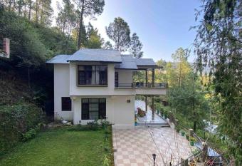 Whispering Pine Villa has Balcony rooms