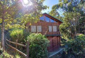 Caba  a Bosque Encantado - A Classic Paradise! allows 18 year olds to book a room