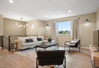 Bright 4BD Suburban Nest with Garage! allows 18 year olds to book a room