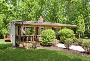 Cabin w Modern Decor Hot Tub Firepit Grill WiFi has rooms with a private hot tub