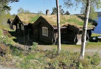 Big rental house in Gautestad has rooms with a private hot tub