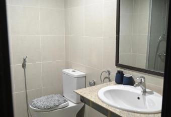 Emaar, Pacific holiday home has rooms with a private hot tub