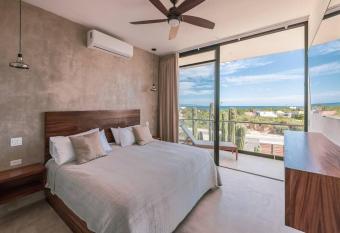 Baja Winds Condo Ocean view has rooms with a private hot tub