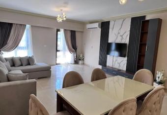 Elegant Hotel Apt in Madinaty Garden View has rooms with a private hot tub