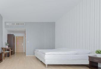 VacationClub Diune Apartament 201 has rooms with a private hot tub