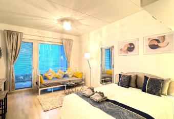 Modern studio near airport, easy to go City center has Balcony rooms