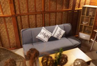 Murna Guest House Bali, Rooftop Balinese wooden house has Balcony rooms