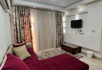 Lovely 2-BR Hotel Apt Madinaty Garden view has rooms with a private hot tub