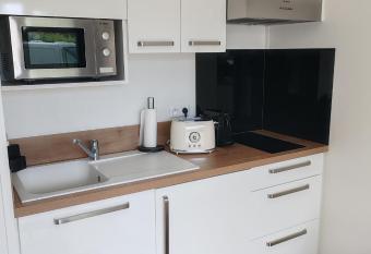 Studio proche a  roport de Nantes Atlantique has Balcony rooms