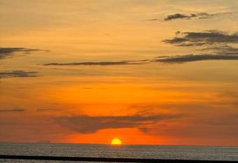 Morros Epic Beachfront Apartment has rooms with a private hot tub