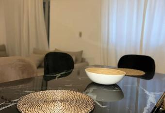 Unique 2-BR Hotel Apt In Madinaty has rooms with a private hot tub