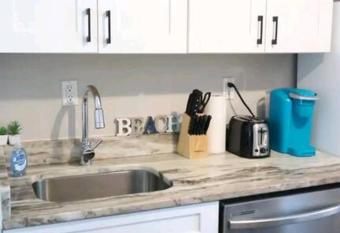 Beach Getaway half mile from the beach with fenced yard allows 18 year olds to book a room