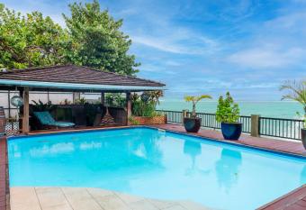 Villa Sunset Manarii in Paea Pool & Beach has Balcony rooms