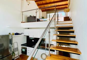 Cosy Loft Apartment in Almada Cristo Rei has Balcony rooms