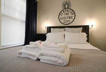 Office themed Apartment with a view allows 18 year olds to book a room