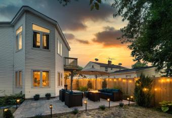 Patio Paradise Stylish 3BR Home with Gaming Room allows 18 year olds to book a room