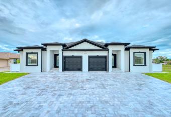 Spacious Waterfront 6 Bedroom Duplex in lovely Rotonda West near oceans  Golfing  Park Pool has Balcony rooms