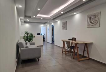 Appartement de 2 chambres avec vue sur la ville terrasse et wifi a Les Abymes has Balcony rooms