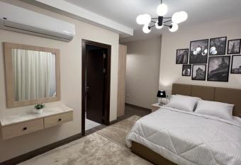 Zed Towers El Sheikh Zayed 3 Bedroom Zed park Bohhemian style has rooms with a private hot tub