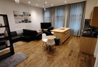Two Bedrooms Flat in City Center has rooms with a private hot tub