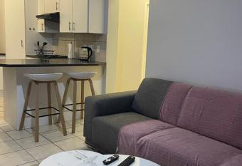 cozy & private 2-bedroom groundfloor apartment has rooms with a private hot tub