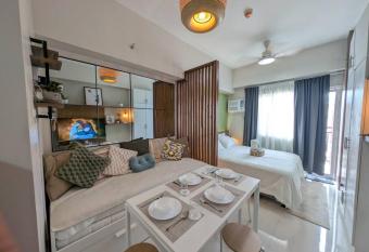 RufiRemy Cozy Hideaway PrimeWorld District Condo has Balcony rooms