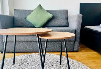 Cozy studio apartment 6 mins by Train to Airport has Balcony rooms