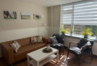 Modern vakantiehuisje aan zee naast de duinen - met duinzicht has Balcony rooms